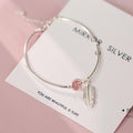 Crystal Round Bead Feather Charm Bracelet